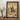 Antiqued gray picture frame with star pattern displaying western desert cowboy artwork