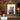 Brown burl wood picture frame displayed in rustic cabin decor